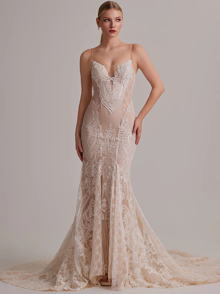 Rosalie: Champagne-blush lace gown with a dramatic plunge, front view