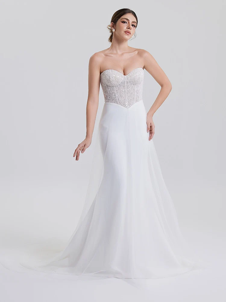 Noëlle: Corset-inspired sweetheart bodice with flowing ivory skirt, front view