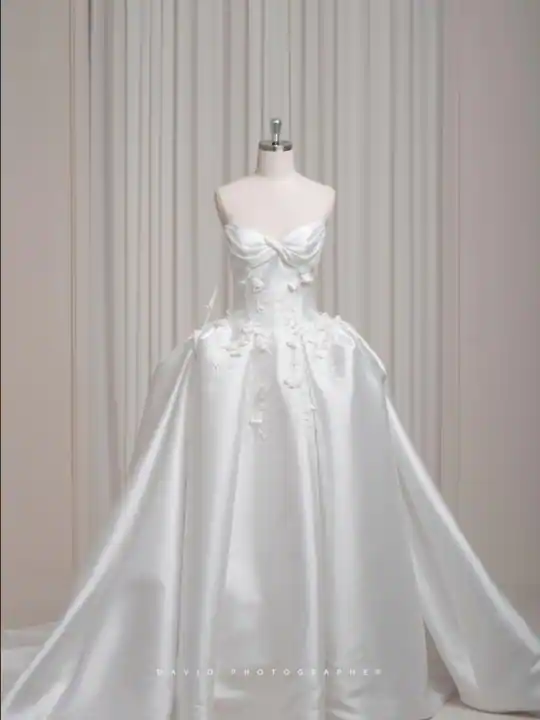 Alina: Architectural satin-look strapless ballgown with a gathered neckline, front view