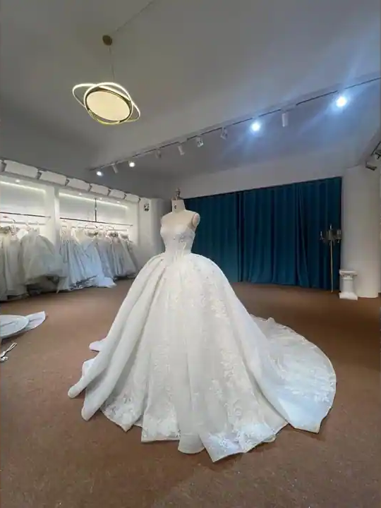 Valentina: Strapless floral embroidery sweetheart ballgown with an expansive train, front view
