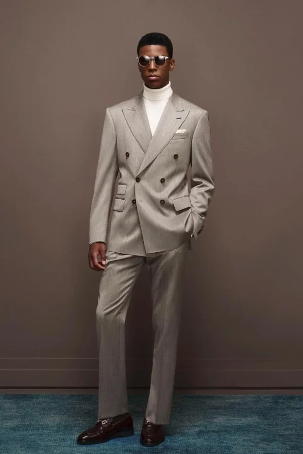 Quiet Horizon: Taupe double-breasted suit with ivory roll neck, editorial inspiration reference photograph