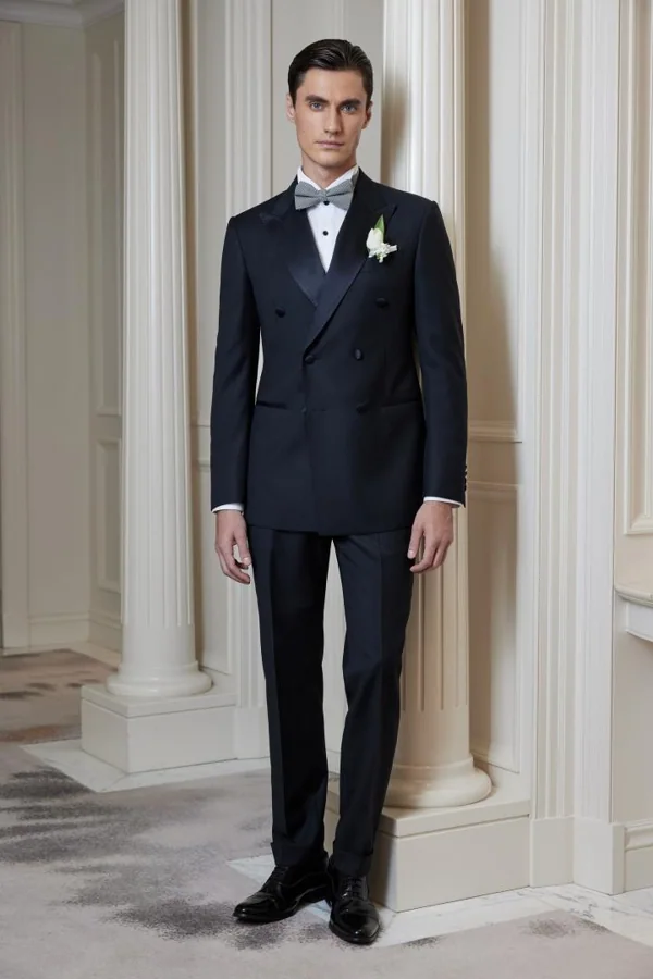 Blue Sonata: Navy double-breasted tuxedo with light grey bow, editorial inspiration reference photograph