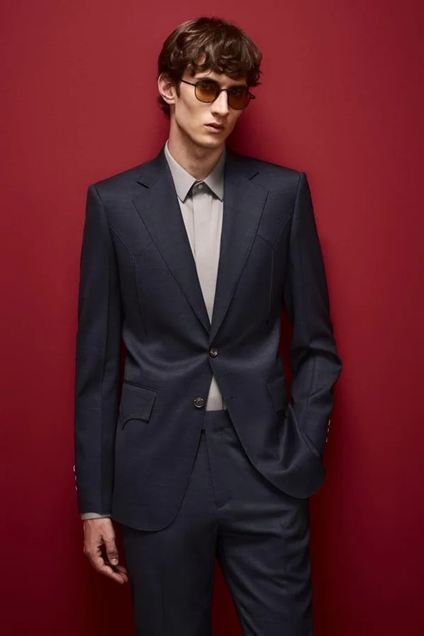 Indigo Promise: Dark navy modern suit with taupe shirt, editorial inspiration reference photograph